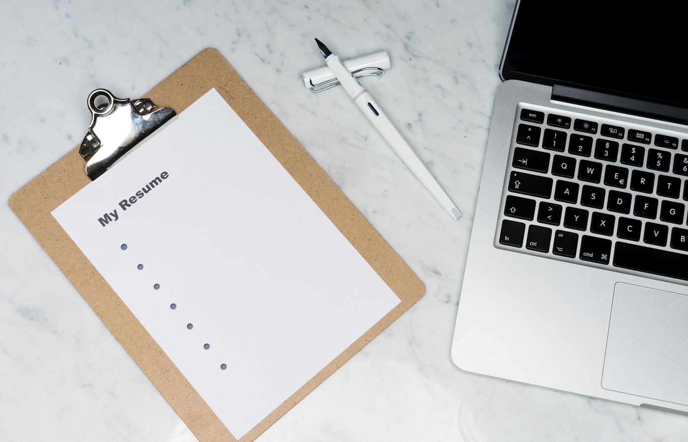 Business documents and pen on a desk ready to send